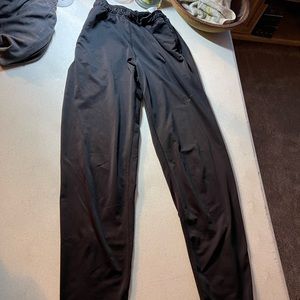 Nike Dri-Fit Pants/Zippered ankles/Elastic waistline/Back pocket with zipper